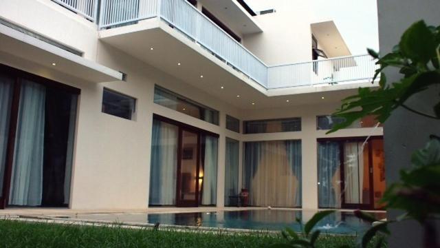 Pasific Beach Cottages Mangsit Kamer foto